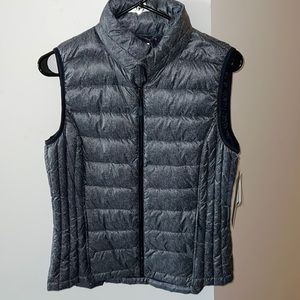 NEW WITH TAGS. Weatherproof vest